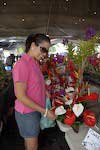 Checking out flowers at a local market